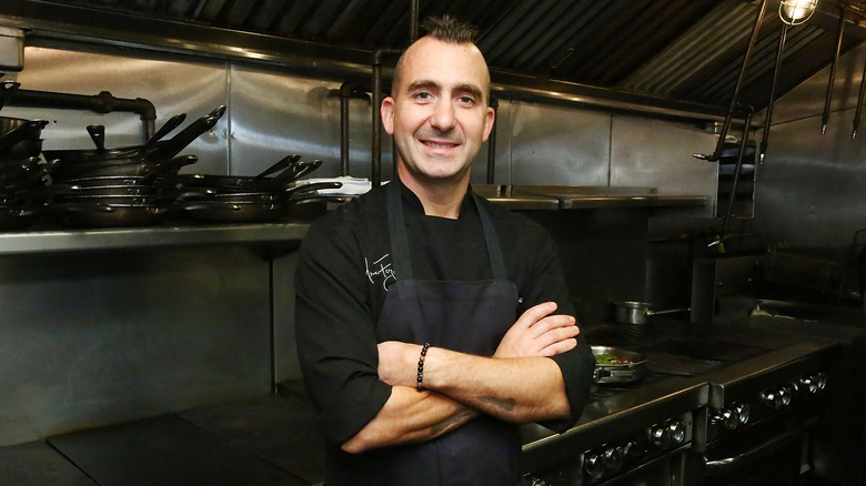 Marc Forgione in a restaurant kitchen