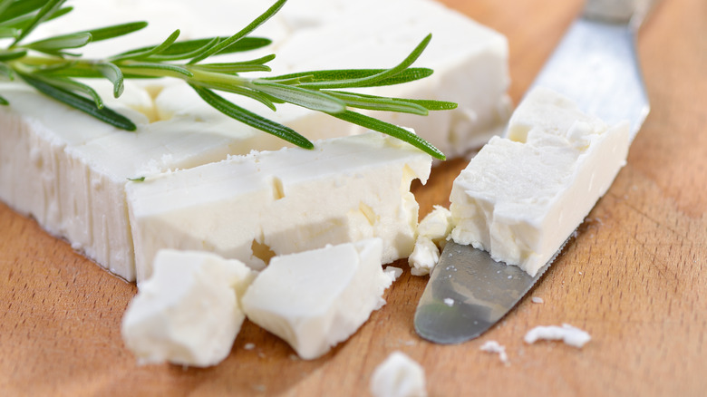 Feta cheese with knife