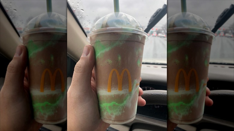 Person holding Chocolate Shamrock Shake