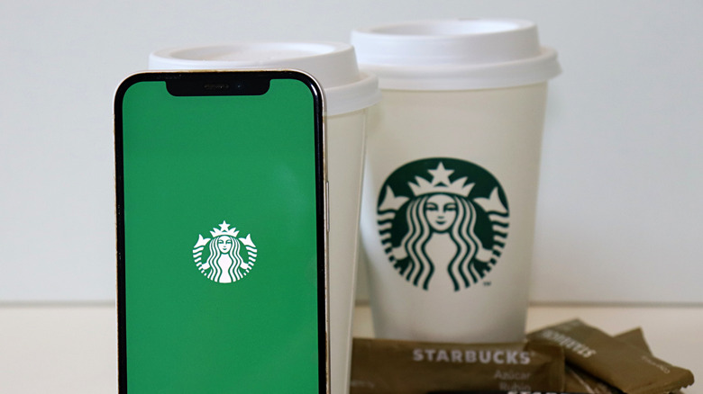 Starbucks phone app and cup