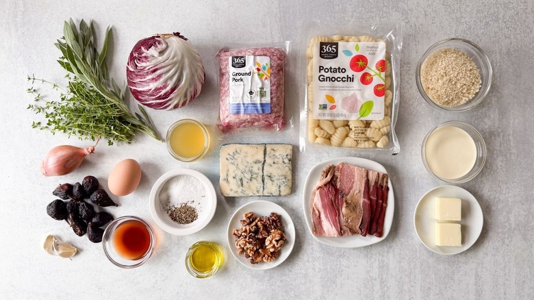 Fig and gorgonzola meatballs with radicchio ingredients on countertop