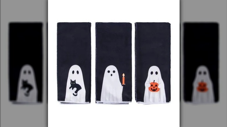 Halloween dish towels on white background