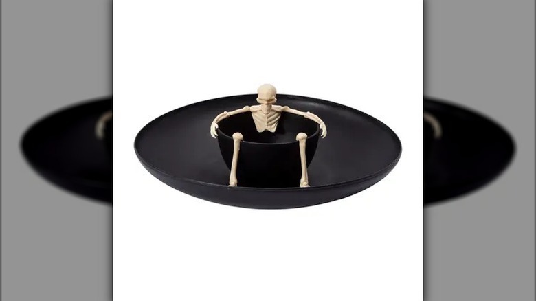 Skeleton chip and dip tray on white background