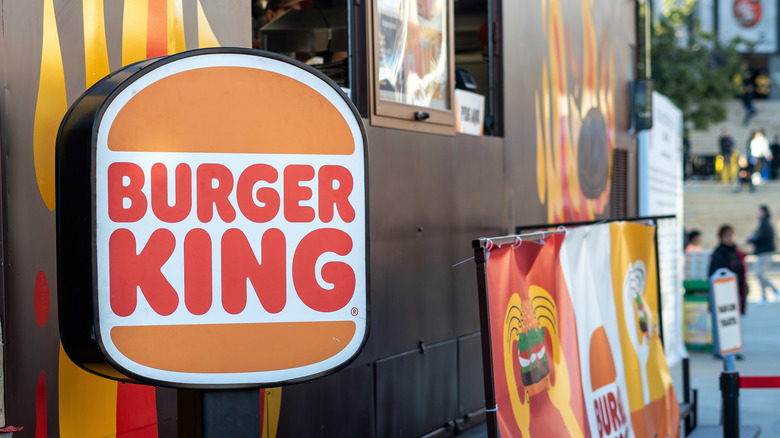 A Burger King sign outside a restaurant