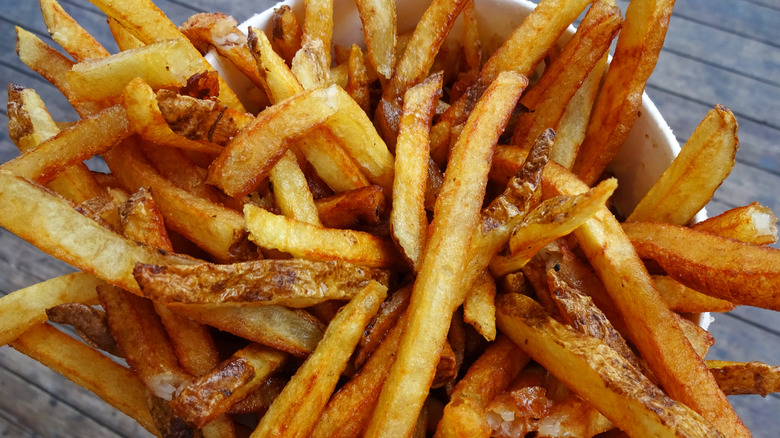 A cup of boardwalk-style fries