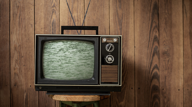 1970s television showing static on a stool