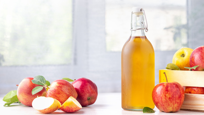 Glass jar of apple juice