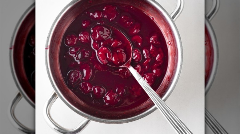 cherry jam cooking in a pot