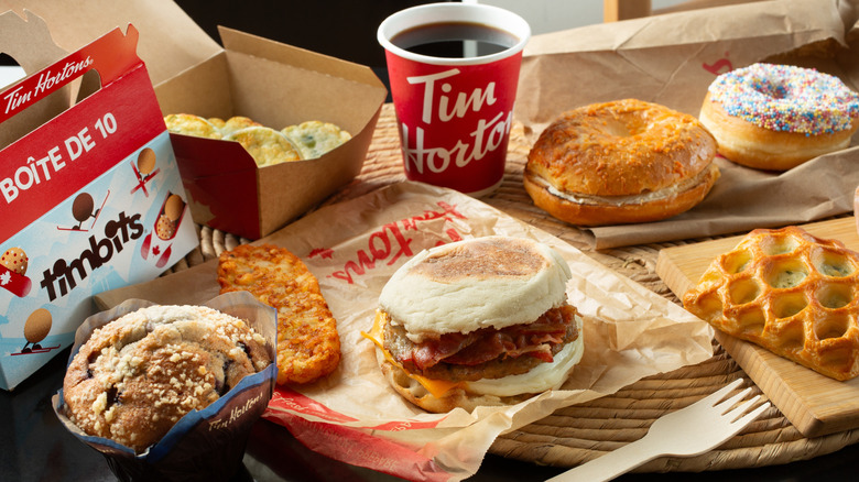 Breakfast items at Tim Hortons are set out on a table.