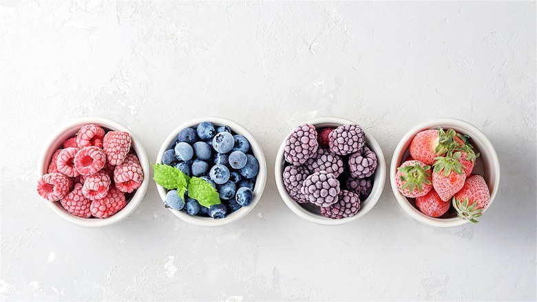 Cups of frozen berries 