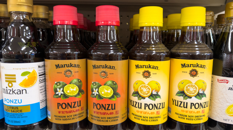 Ponzu sauce bottles on a grocery store shelf