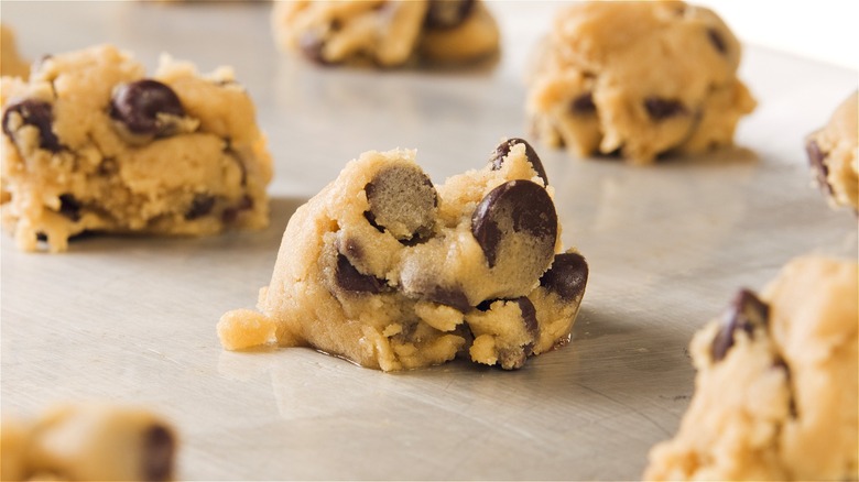 Cookie dough mounds on baking sheet 