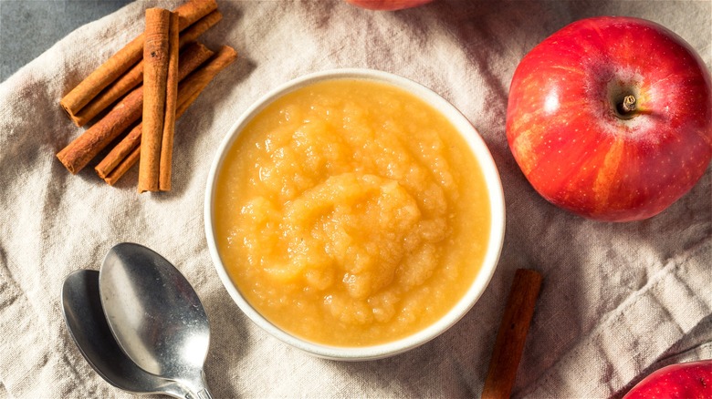 Bowl of applesauce with spoons
