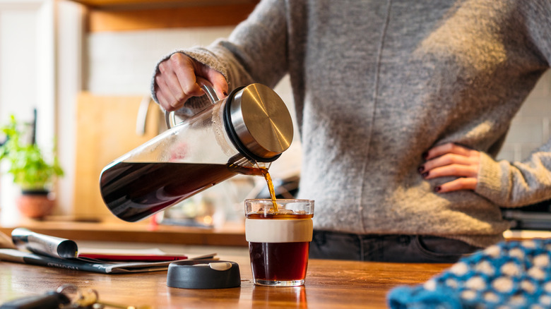 Woman pouring cold brew