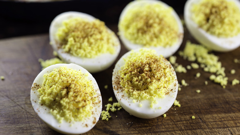 Closeup of deviled eggs with paprika 