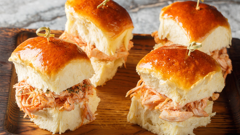 Hawaiian roll sliders on wood board