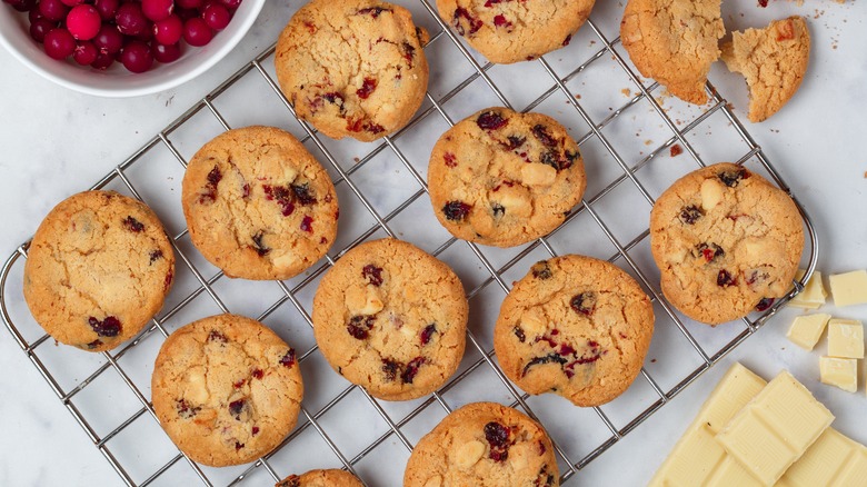 White chocolate cookies on cooling rack