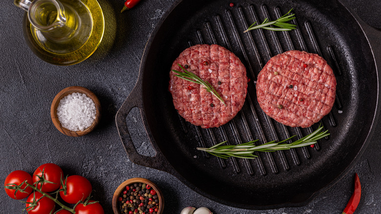 Burger patties in a pan