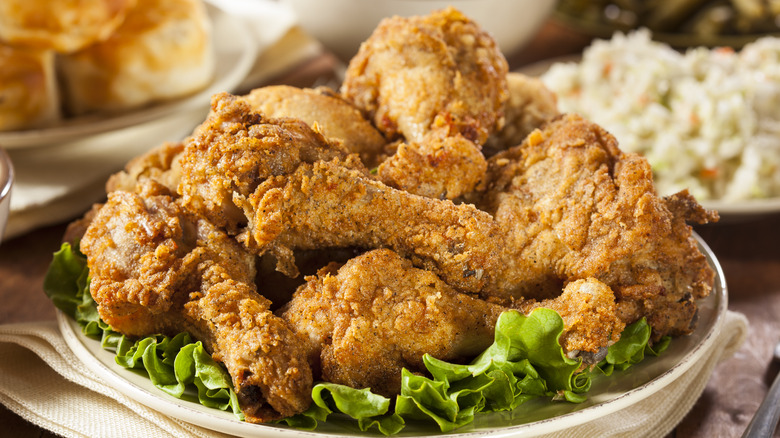 fried chicken drumsticks on a plate
