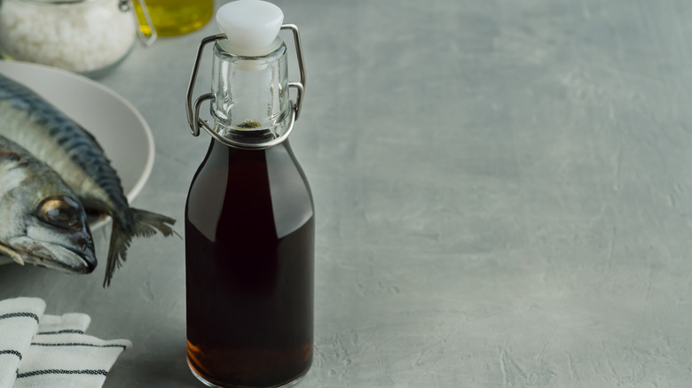 Fish sauce in a bottle on counter