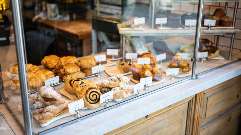 Bakery case with various types of baked goods