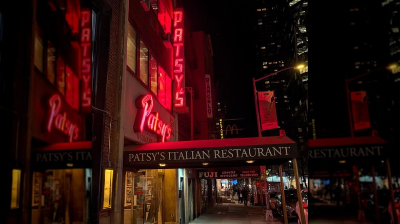 The exterior of Patsy's Italian Restaurant, seen at night