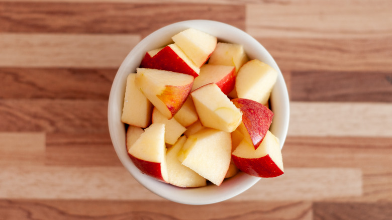 Bowl of chopped red apples