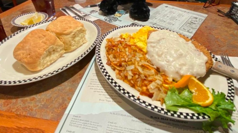 Black Bear Diner chicken fried steak, served with eggs, hash browns, and dinner rolls