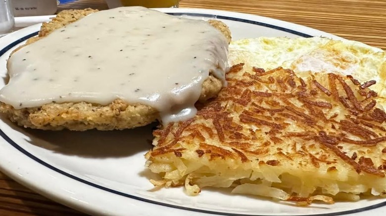 IHOP country fried steak, served with a hash brown