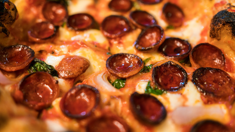 Closeup of pizza with mozzarella and pepperoni