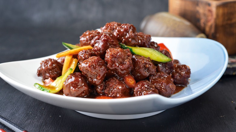Sweet and sour meatballs on plate