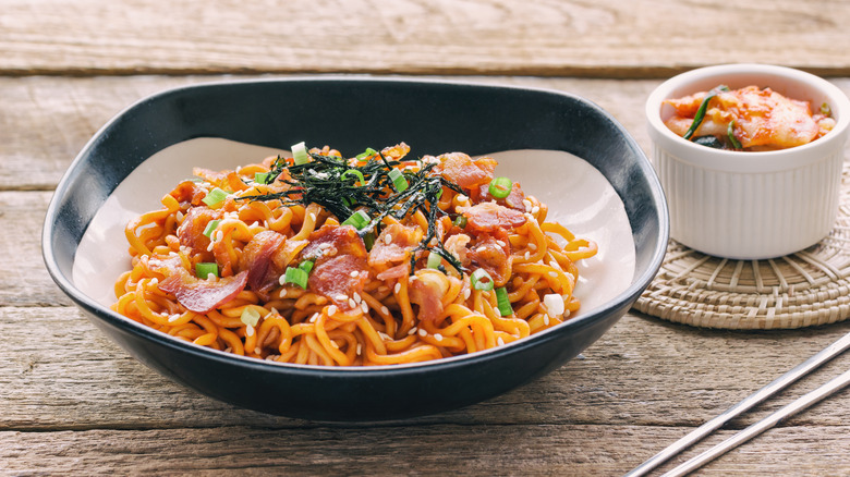 Bowl of ramen topped with bacon