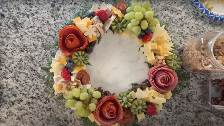 charcuterie wreath on a granite counter top