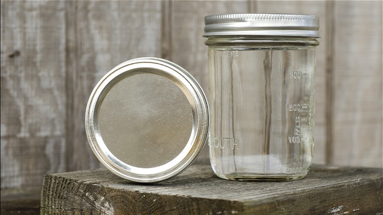 Mason jar next to lid 