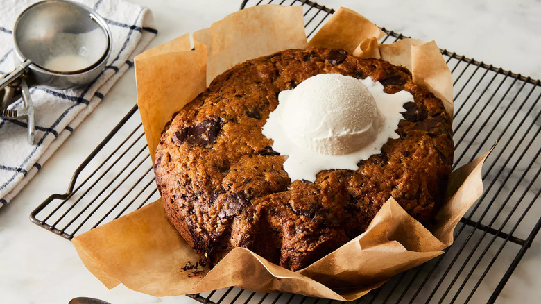 Large chocolate chip cookie cake with ice cream