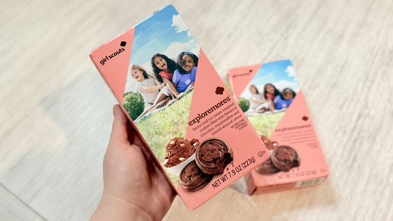 Holding a box of Exploremores