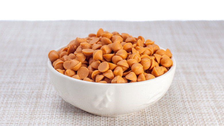 Butterscotch chips in white bowl
