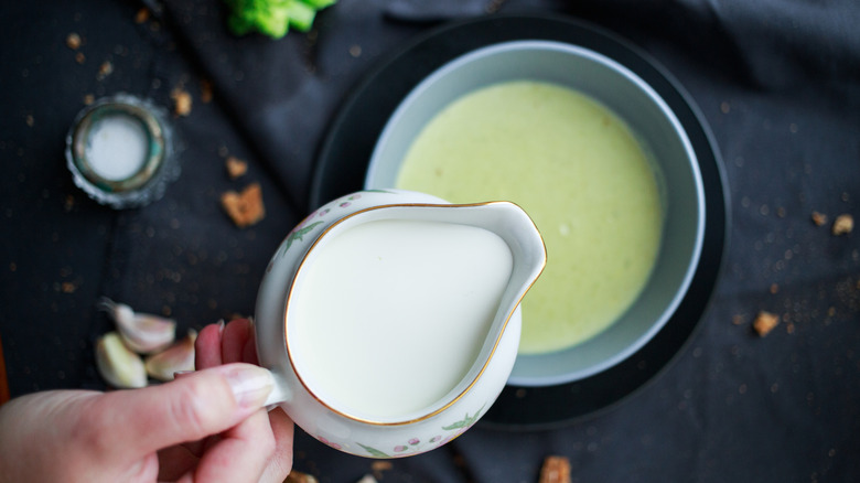 Jug of half and half in soup