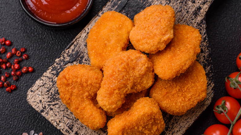 fried chicken nuggets with tomato sauce