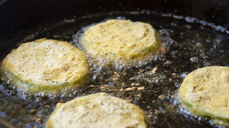 fried green tomatoes in cast iron skillet