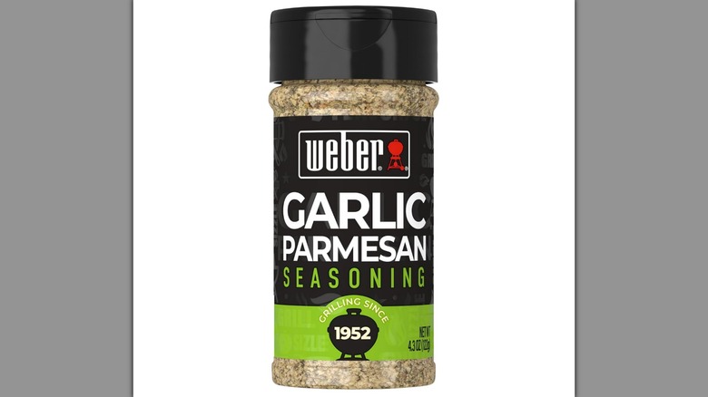 A bottle of Weber Garlic Parmesan Seasoning on a white background