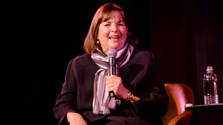 Ina Garten speaks into a microphone onstage