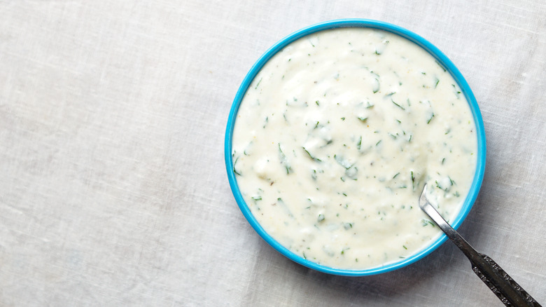 homemade ranch dressing in a blue bowl 