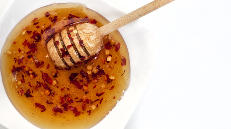 Hot honey being mixed in a dish