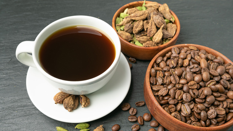 Cardamom pods and coffee