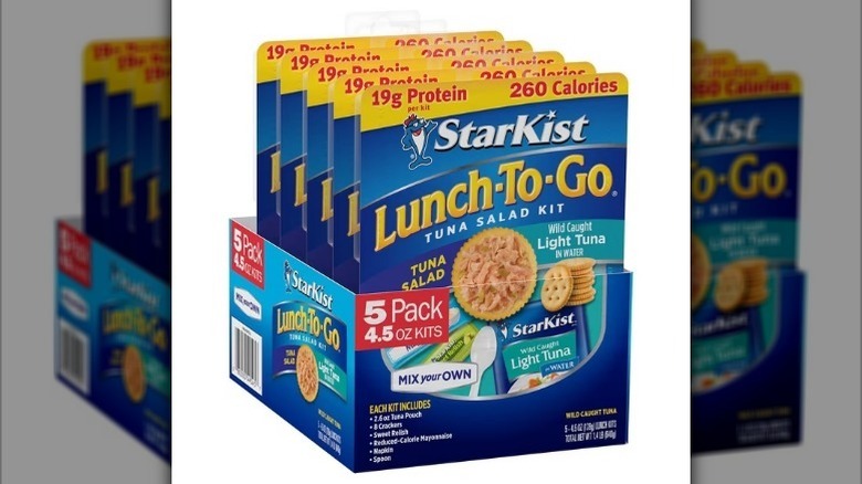Lunch to go tuna salad kits on white background