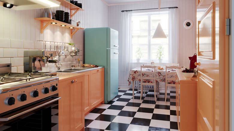 Kitchen with checkerboard flooring