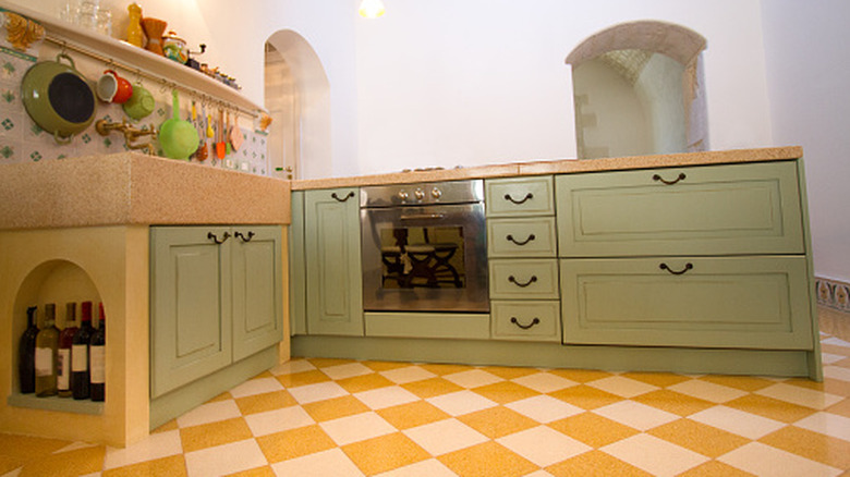 Kitchen with yellow checkerboard flooring