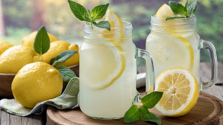 Mugs of lemonade on a table