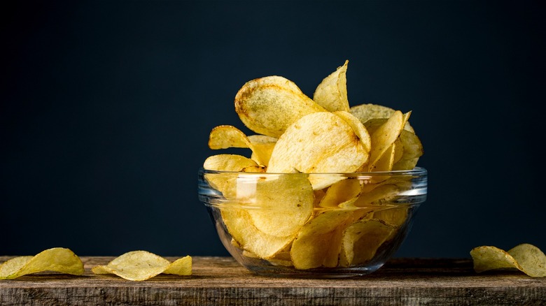 Clear bowl of potato chips 